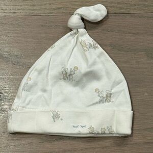 Lively Cream Knot Baby Hat with Subtle Animal Print